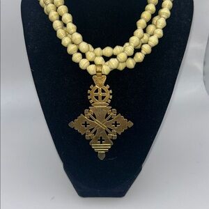 NWT Akola Cream Colored Triple Strand Cross Necklace